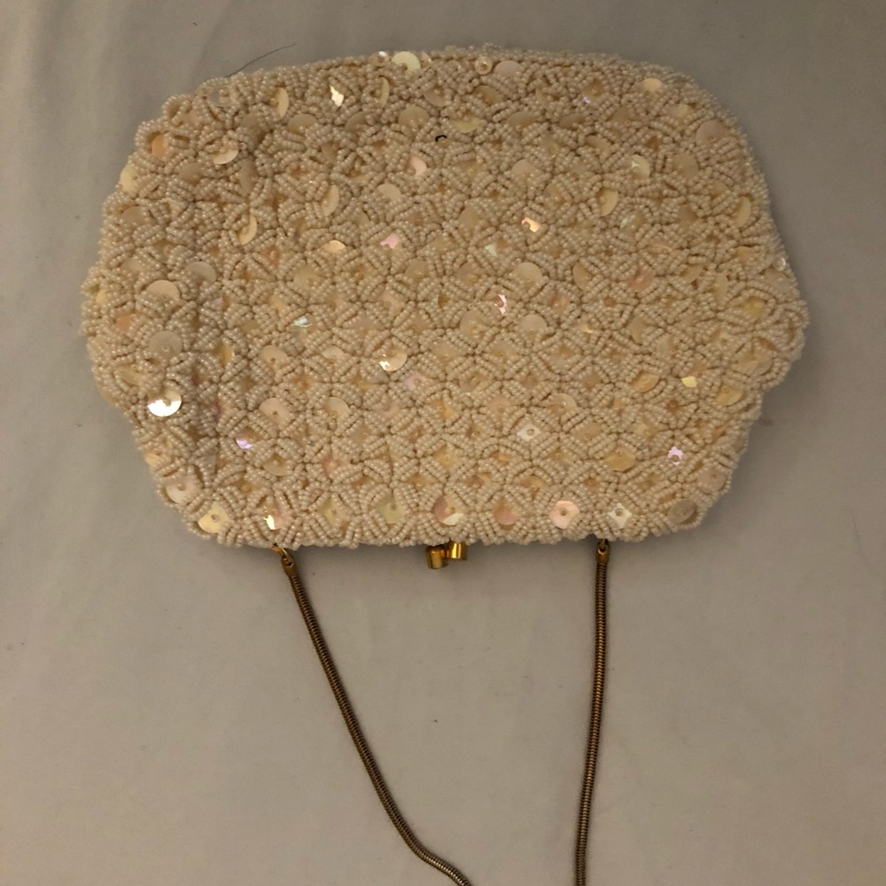 Antique cream beaded clutch